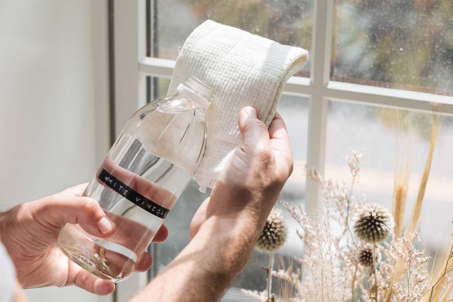 cleaning a window for good feng shui